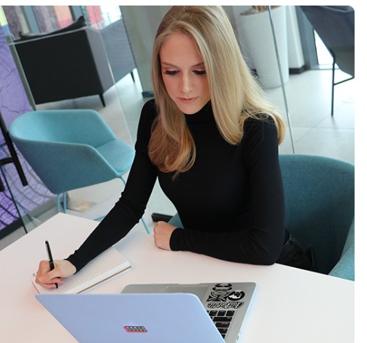 Gaby Fafard, licensed health insurance advisor, working at her computer